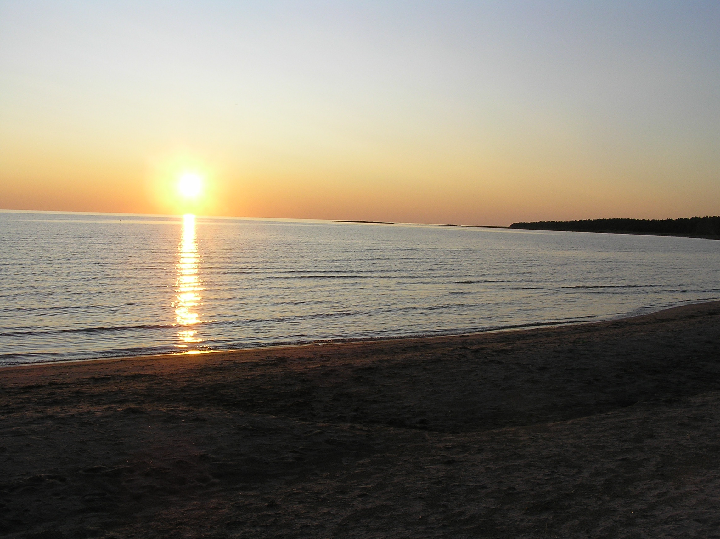 Liivarand ja päikeseloojang